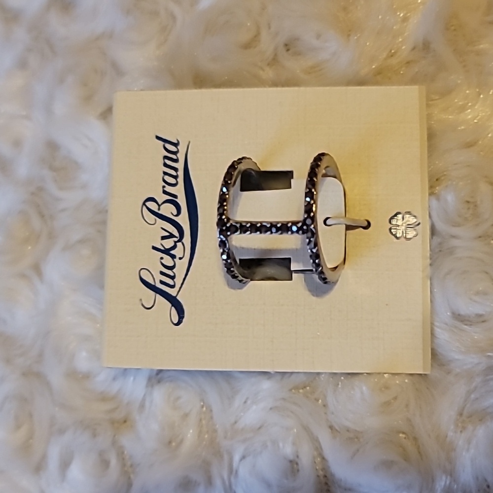 Lucky Brand size 7 ring. Silver color with tiny black stones